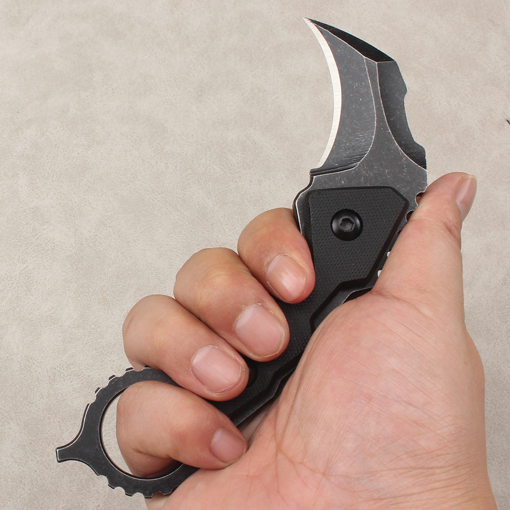 High-quality outdoor and survival knife: portable, high-hardness, sharp, compact—suitable for wilderness use or as an everyday carry fruit knife.